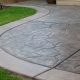 Elevate Your Property's Style: Expert Installation of Decorative and Stamped Concrete for Any Space Concrete is very important for building and design, making sure that structures are strong and look good. Not only does it help buildings stay safe, but concrete also can be used in many ways to make homes or offices more attractive. One very good way to make this change is by using expert installation of decorative and stamped concrete. In this blog, we will talk about how concrete services can improve your property’s look with the help of decorative and stamped concrete. The Versatility of Decorative and Stamped Concrete Decorative and stamped concrete is very popular with homeowners and business owners who want to make their properties look nicer. Unlike normal concrete, which can seem boring and plain, decorative and stamped concrete can copy the appearance of different materials like brick, stone, or even wood. This flexibility gives many choices for design, allowing both traditional and modern styles. Benefits of Decorative and Stamped Concrete Aesthetic Appeal The main advantage is it makes things look nicer. Decorative and stamped concrete can be made to have many different designs, colors, and textures. This makes it a good choice for places like patios, driveways, walkways, and around pool areas. Durability Concrete is famous for its strong and long-lasting nature. When put in place correctly and taken care of well, decorative and stamped concrete surfaces can handle lots of people walking on them, tough weather conditions, as well as everyday use without much trouble. Low Maintenance Unlike natural stone or wood, concrete needs very little care. Most of the time, just sealing it regularly and cleaning it once in a while is enough to make it look good for many years. Cost-Effective When you compare it with other expensive materials, decorative and stamped concrete is more budget-friendly. It gives a fancy appearance but doesn't come with a high price tag. Premier Concrete Removal Services Before putting in decorative or stamped concrete, it's usually important to take out old concrete parts. This is when premier concrete removal services in MT are needed. These services are very important to make sure everything starts fresh, without any old, broken, or ugly concrete. Why Premier Concrete Removal Services Are Important Preparation for New Installations Taking away old concrete is very important for making a strong base for new works. Good concrete removal services make sure the new concrete sticks well and stays good for a long time. Safety and Aesthetics Old, cracked, or uneven concrete can be dangerous and make your property look bad. Professional removal services fix these problems so that your area becomes safer and looks nicer too. Environmental Considerations Professional concrete removal services usually include proper disposal and recycling of old concrete, which helps to reduce environmental impact. Best Site Preparation Contractors The success of any project involving concrete installation is very much dependent on how well the site is prepared. The best site preparation contractors in MT make sure that the ground is made ready properly, giving a strong foundation for placing the concrete. Responsibilities of Site Preparation Contractors Before starting work, contractors first check the site to understand soil conditions, drainage systems, and possible difficulties they might face. Doing the right excavation and grading is very important to make sure that the concrete surface is flat and has good drainage. This work includes taking away any trash, making the ground even, and building a strong base. Making the soil and base material compact is important to stop future sinking and cracks in the concrete. Site preparation contractors talk with utility companies so they do not hit underground pipes and cables when digging. Affordable Concrete Driveway Repair Driveways experience a lot of use on any property, so they often get damaged and worn out. Hiring the services of affordable concrete driveway repair in MT can protect the aesthetics as well as the functionality of your driveways without costing you too much money. Common Driveway Issues and Solutions Cracks and Potholes These are the most common problems. Repair services often include filling cracks with strong concrete mix and fixing potholes to make smooth surfaces. Staining and Discoloration Over time, driveways can get dirty and stained from oil, dirt, and other things. Cleaning and sealing them can help make them look like new again. Erosion and Settlement Bad drainage can make soil wash away and buildings settle unevenly. Fixing this might include changing the ground's slope and making better ways for water to flow, so these problems don't happen again later. Resurfacing For driveways with big damage, resurfacing might be the best way. This job means putting a new concrete layer on top of the old surface. It makes the driveway look new and also stronger. Professional Structural Concrete Contractors For more complicated projects, like building foundations, retaining walls, and structural supports, professional structural concrete contractors in MT are very important. These specialists possess the knowledge and practice necessary to meet the strict requirements of working with structural concrete. The Role of Structural Concrete Contractors Design and Planning Structural concrete contractors collaborate closely with architects and engineers to create detailed designs that fulfill all safety and structural standards. Formwork and Reinforcement Right formwork and reinforcement are very important for keeping structural concrete strong and stable. Builders use steel rods, wire mesh, and other items to make the concrete stronger. Pouring and Finishing The pouring and finishing of concrete needs careful attention to make sure the surface is even, smooth, and without air bubbles or other flaws. Curing and Inspection After pouring the concrete, it needs to cure well to become strong completely. Contractors watch over this curing time and do checks to make sure the finished product follows all requirements. Conclusion Concrete services can give many choices for making your property look better and work well. Starting from the first site preparation to the last finishing details, every step is very important for getting a good result. By using professional concrete services, you can make surfaces that look nice, last a long time and are easy to take care of. This will improve how your property looks and increase its value. Whether you need to remove old concrete first, prepare the area for new work, fix a driveway without spending too much money, or do important structural concrete projects; working with experienced contractors will help bring your ideas to life just like you imagine them.